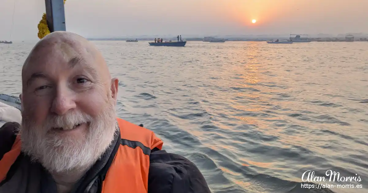 Alan Morris on a sunrise boat ride on the River Ganges.